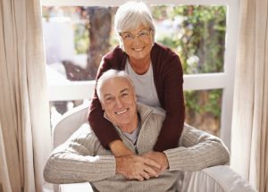 Happy mature couple spending time together at home