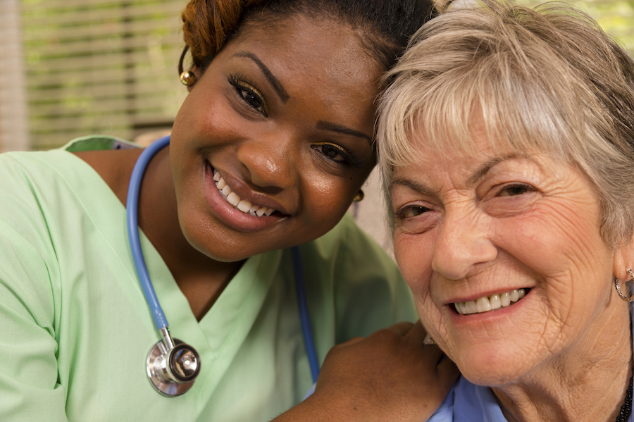 Nurse with a senior woman