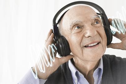 man listening to music with headphones