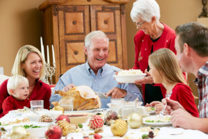 Family having a holiday dinner with senior loved ones