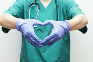 Doctor Making Heart Shape With Hands