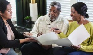 A family discusses Parkinson’s care planning together as they consider future care and support needs.